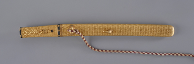 Important cultural property Short-sword mounting covered with a gold plate-embossed from the back, with a design featuring a kikko turtle shell pattern